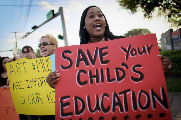 Protest against arts programs funding cuts