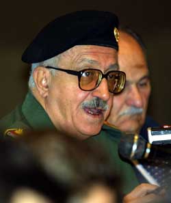 Tariq Aziz speaking.