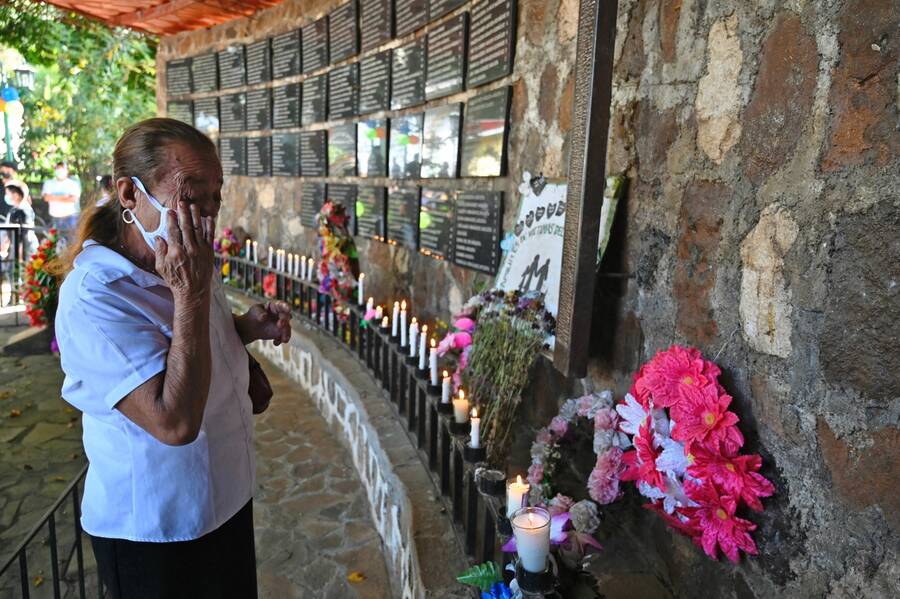 A relative of a victim cries during the commemoration of the 40th anniversary of a massacre in El Mozote.