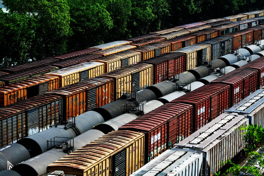 Image of Group of train cars parked in a Pilsen yard